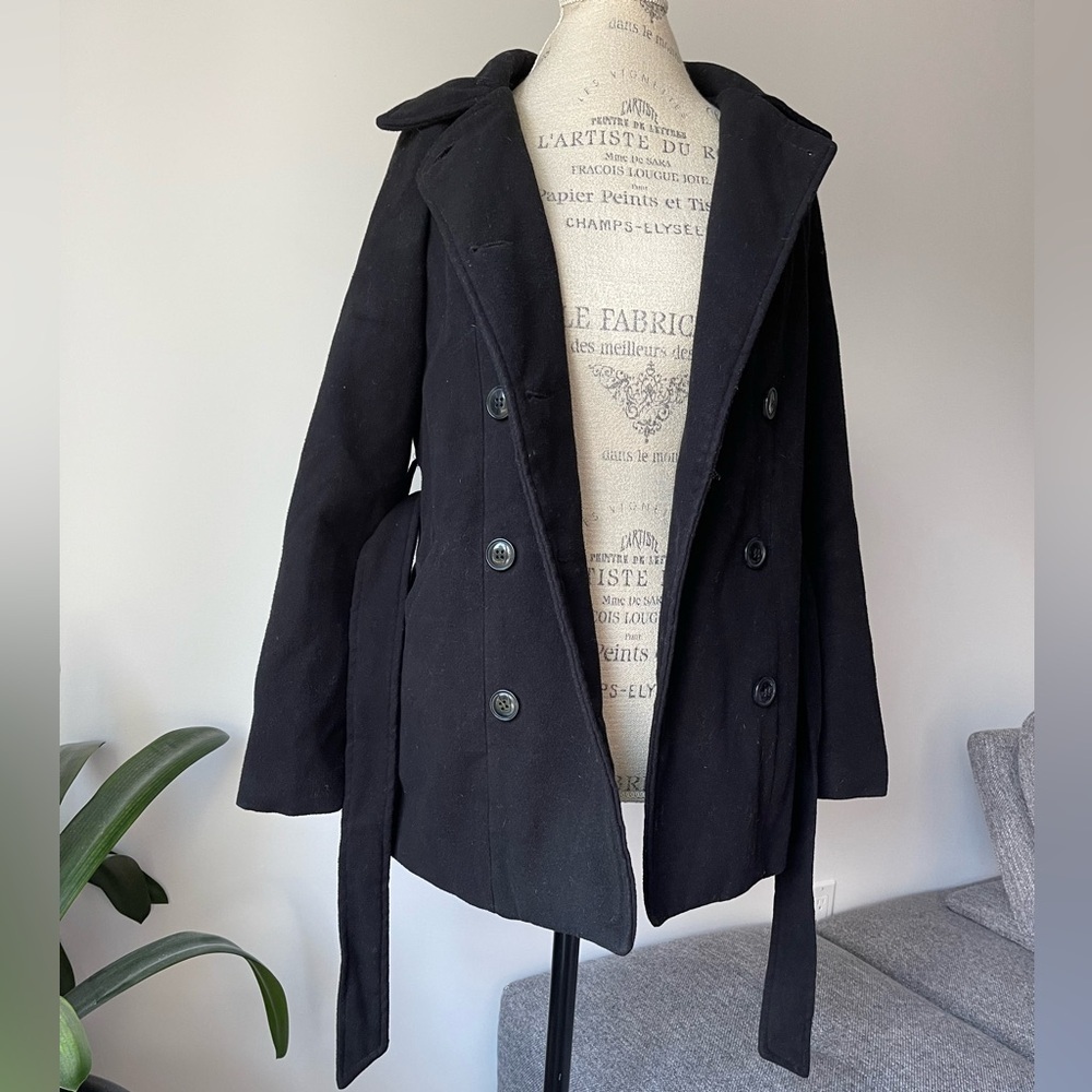 Women's black coat with button front and belt